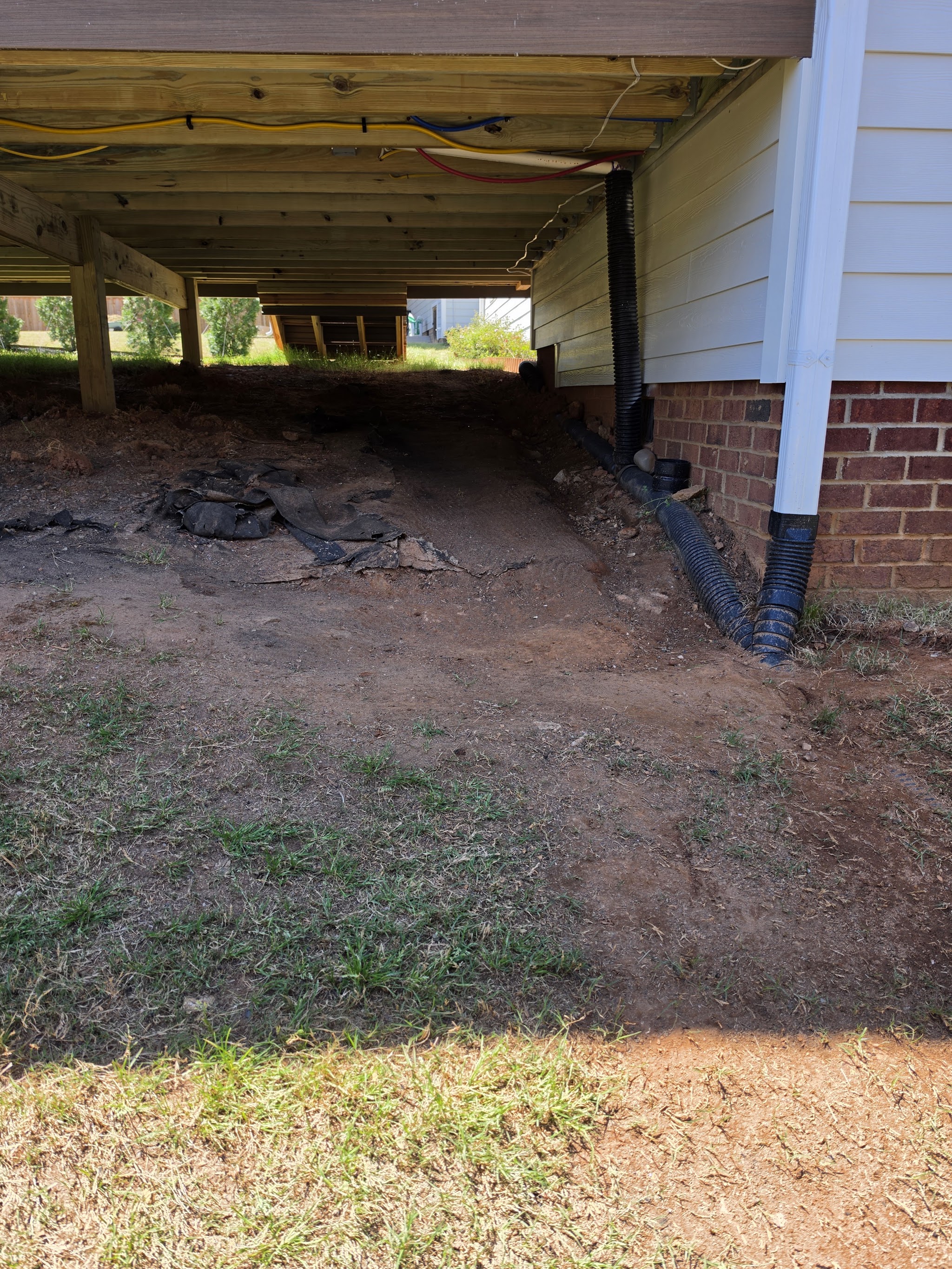 A crawlspace under a house cleared and clean